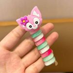 کش مو فنری عروسکی