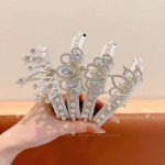 گیره گوجه‌ای مو شانه‌دار